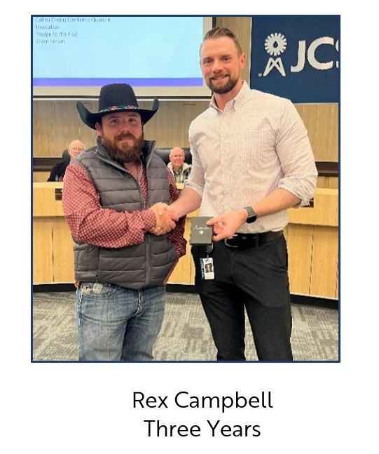 Staff member being presented with award