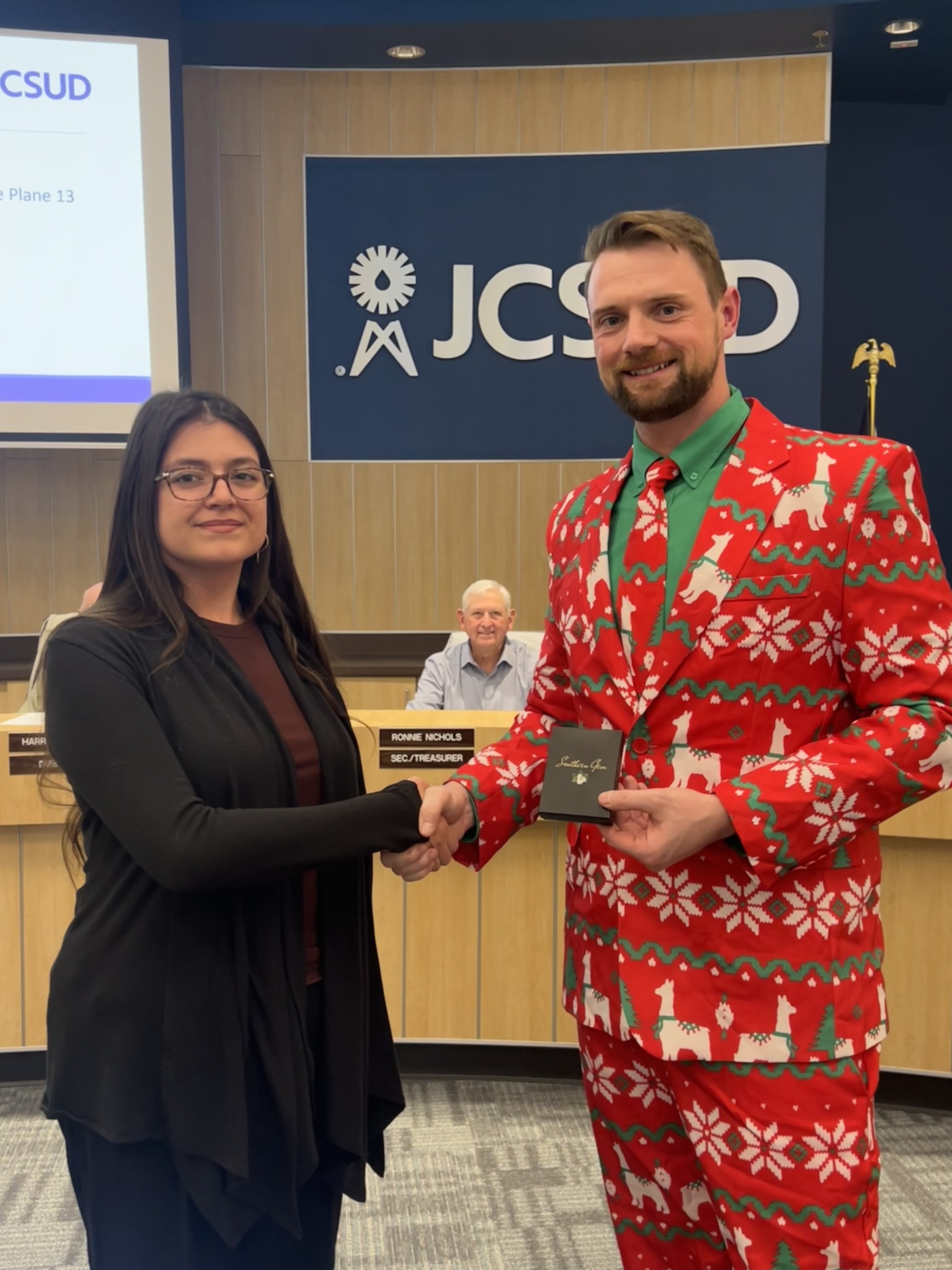 JCSUD employee receiving a service award from the General Manager